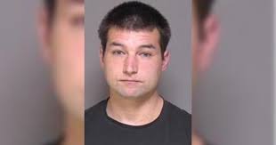 Former MN trooper, facing charges in deadly crash, booked at Olmsted County  Jail