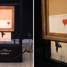 So what does this mean? Partial Shredding Of Banksy S Girl With Balloon Art At London Auction Was A Malfunction