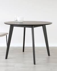 Not only do they look great, they are designed to fit in any sized dining space. Roxanne Round Dark Wood Dining Table Danetti