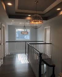 White wainscoting walls in the formal dining room, with sw 7018 dove tail grey paint above the a tray ceiling (a ceiling with series of steps or layers) can be a special architectural feature in a home. Top 50 Best Tray Ceiling Ideas Overhead Interior Designs