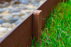 Consider white picket fence garden edging. Scenery Solutions Lek Cir Composite Wood Garden Edging Exiladodemarilia