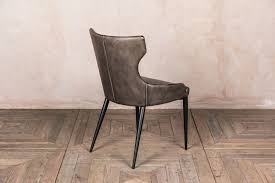 They make a dining room feel extra charming and inviting. Wingback Dining Chairs The Admiral Peppermill Interiors