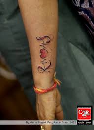 Star s design tattoo near the wrist: Letter Tattoo Design Crazy Ink Tattoo Body Piercing In Raipur India