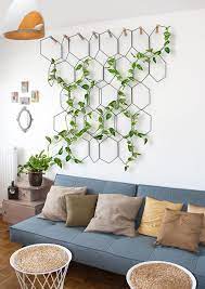 Now you can buy home decor online and access a the regal floral vines photo frame is an ideal way to preserve those melting moments. 6 Ways To Include Indoor Vines In Your Interior Modular Hexagon Wall Hangings Are Designed To Add A Geometric Element To Plant Decor Indoor Indoor Vines Home