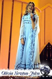 Olivia says she was initially horrified by the project, revealing: Olivia Newton John That S Eurovision