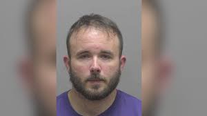 CMPD officer arrested, charged for harassment, department says