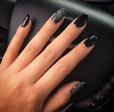 Check out our black glitter nails selection for the very best in unique or custom, handmade pieces from our craft supplies & tools shops. Black Almond Shaped Nails With Glitter Black Nails With Glitter Almond Gel Nails Nail Designs Glitter