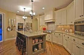 The stain and paint that we sell has been expertly matched by sherwin williams to match the finish on your cabinets. Cabinet And Island Colors Antique White Kitchen Antique White Kitchen Cabinets Antique White Cabinets