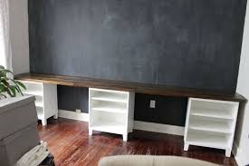 Black design wall, fabric cabinets & multipurpose table. My Extra Long Sewing Desk Is In The Works Ikea Hack Sewcanshe Free Sewing Patterns And Tutorials