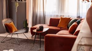 Living room with couch, coffee table, painting. How To Decorate A Small Living Room