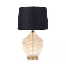 Overhanging lamps give you another excuse to read one more chapter in your favourite armchair. Table Lamps Chic Table Lamps Online For A Modern Look