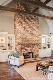 Continue to 4 of 29 below. Fireplace In Vaulted Ceiling With Wooden Beams 2015 Birmingham Parade Of Homes Built By Murphy Home Builders House Red Brick Fireplaces Farmhouse Firepla