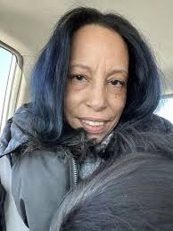 Another lovely shade. U shape, mid length layers, auburn color. And curled  with 1 inch iron.