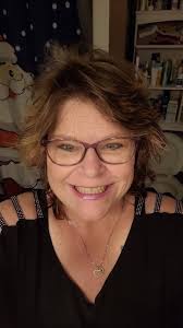 What hairstyle suggestions are suitable for a 54-year-old woman?