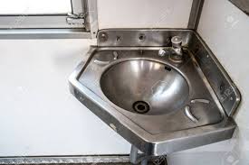 stainless steel sink in the corner on