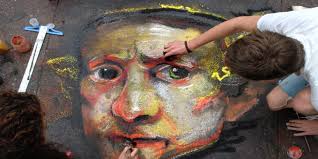 Splash of rainwater, artists' hues at sidewalk art festival