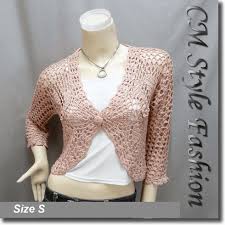Maybe you would like to learn more about one of these? Floral Crochet Scallop Beaded Bolero Top Pink