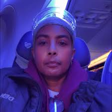 What is the process of applying for a piece of land in Belize?