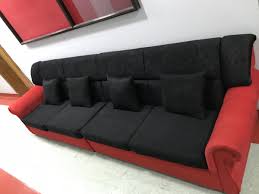 عرض أثاث للبيع كنب 5 اشخاص بحاله ممتازه لون احمر واسود مركز البحرين التجاري