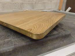 I have seen on sites, tables that have rounded edges. 32 Square Oak Top Rounded Corners With Aged Brass Edge Band Round Corner Corner Furniture Aged Brass