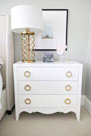 With a roomy shelf and drawer, there's plenty of space for a table lamp, books, a charging dock and more. San Clemente Home Tour With Shea Mcgee White And Gold Nightstand Gold Bedroom Home Decor