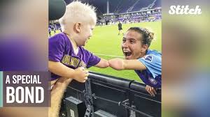 Soccer player, 2-year-old born without hand share special bond