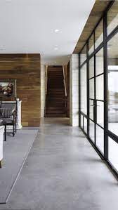 Concrete is normally laid much thicker than screed, with a recommended thickness of at least 100mm for domestic use, and up to double that thickness for areas in which there is heavy use. The Pros And Cons Of Concrete Flooring House Flooring Concrete Floors House Design