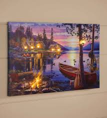 Blogger's home with dark decor, creative lighting solutions, modern furniture, textured feature walls, and a home studio for making youtube videos and podcasts. Huis Campfire Cabin Woods Fire Lighted Canvas Wall Decor Sign Lights Up New Luxclusif Com