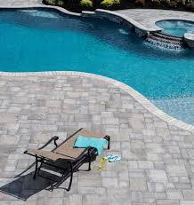 Add decorative rock or mulch in this area. Paver And Wall Design Ideas Pool Pavers Backyard Pool Landscaping Pool Patio Pavers