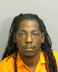 Man arrested for burglary during exposure investigation