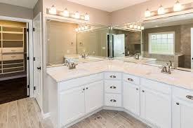A bathroom vanity is a piece of furniture that holds your bathroom sink and has cabinets with doors or drawers that you can use to store toiletries and other supplies. 30 Bathrooms With L Shaped Vanities Home Stratosphere
