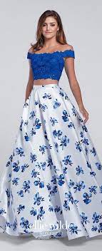 In honor of everyone begining their prom dress search i was feeling sentimental and wanted to post a few throw backs from prom last year. Prom Dresses 2017 Ellie Wilde For Mon Cheri Two Piece Royal Blue White Floral Prom Dress With L Prom Dresses Two Piece Prom Dresses 2017 Piece Prom Dress