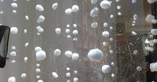 Threading Cotton Balls On Fishing Line To Look Like Snow Dollar Store Christmas Christmas Window Decorations Christmas Decor Diy