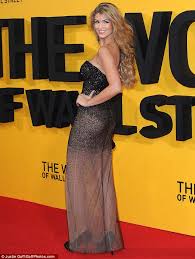 Money, huge party's, drugs, night life, sex. Wolf Of Wall Street Premiere Amy Willerton Flashes Her Underwear And Pert Derriere In A Sheer Sequin Gown Daily Mail Online