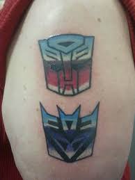 We carry a variety of sizes, shapes, and designs, so you can find the tattoo that's the best fit with your audience. 37 Transformer Logo And Symbol Tattoos