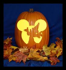 Going full disney this year. Superb Pumpkin Carvings With Mickey Minnie And Walt Between The Pages Blog