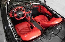 Pushbutton door handles, key lock, inside release. C1 Restomod Sports C5 Power Beautiful Red Interior Corvetteforum