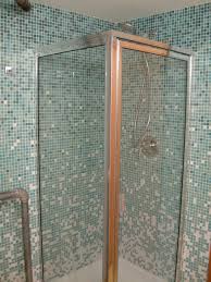 When choosing mosaic tile from the wide variety of colors and styles on the market, consider glass. Stainless Steel Frame Small Glass Shower Stall Combined With Blue Glass Mosaic Wall Panel Bathroom Diy Bathroom Design Bathroom Design Small Glass Tile Shower