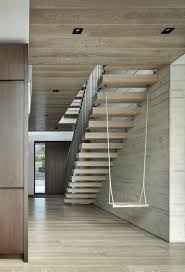Kenwood Lee House S Four Floors Are Arranged Around A Triple Height Skylit Concrete Core A Central Floating Staircase Of Oak Treads In 2020 Schodiste Nabytek Stodola