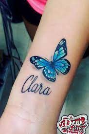 Beautiful And Meaningful Butterfly Tattoo Guide Butterfly Tattoo Designs Butterfly Name Tattoo Blue Butterfly Tattoo