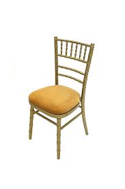 Old gold gilt chairs and a tapestry wall hanging. Gold Chivari Chair Hire Weddings Event Chair Hire Be Event Hire