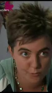 Cam And Tracy In The Iconic Red Car