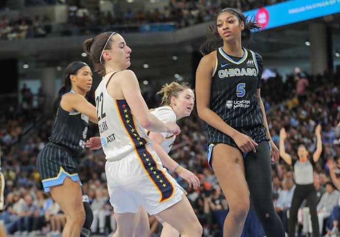 Angel Reese arrives for Caitlin Clark showdown in 'wonder woman fit' after  her Michael Jordan tribute sweatshirt
