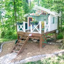 What better way to do that than to look for some playhouse plans and build them a tiny castle in your garden or backyard? Diy Backyard Playhouse With Slide Our Handmade Hideaway