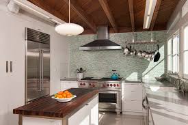When remodeling a midcentury modern kitchen, consider updating the finishes, appliances, and storage while keeping the efficient layout. Mid Century Modern Kitchen Remodel And Addition To At 1946 William Kesling Residence Is Architecture