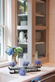 20 Corner Cabinet Ideas That Optimize Your Kitchen Space Corner Kitchen Cabinet Glass Kitchen Cabinets Glass Kitchen