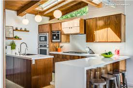 Remodeled Warm But Bright Mid Century Kitchen In California Walnut Cabinets White Cae Modern Kitchen Remodel Kitchen Decor Modern Mid Century Modern Kitchen