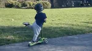 A toddler's sassy approach to scootering is turning him into social media's #scooterkid. Social Media Can T Get Enough Of This Young Boy S Scooter Trick