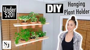 These planting boxes make it easy to add an herb garden to your features * crafted from clear acrylic, it features a dual waterfall edge with a bottom display shelf. Diy Hanging Plant Shelf Under 20 Youtube