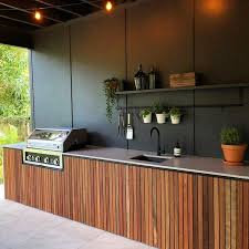 The cooking oil spray will prevent the grill from rusting. Kitchens Custom Cabinetry On Instagram Outdoor Bbq Kitchen Area Created For Squarefoxdesigns Wit Outdoor Bbq Kitchen Outdoor Kitchen Outdoor Kitchen Bars